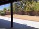 Expansive backyard features a covered patio and mature trees, perfect for relaxation at 1156 E Vinedo Ln, Tempe, AZ 85284