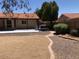 Backyard featuring a patio, walkway, and privacy fence at 1156 E Vinedo Ln, Tempe, AZ 85284