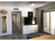 Modern bedroom with a TV and sliding glass doors at 1156 E Vinedo Ln, Tempe, AZ 85284