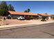 Single story home with an attached garage and low maintenance landscaping at 1156 E Vinedo Ln, Tempe, AZ 85284