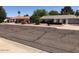 Well-maintained homes featuring tidy landscaping and inviting curb appeal at 1156 E Vinedo Ln, Tempe, AZ 85284
