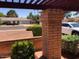 Charming home featuring beautiful landscaping and a private pergola-covered front patio at 1156 E Vinedo Ln, Tempe, AZ 85284
