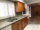 Bright kitchen with granite countertops, cabinets and new stainless sink at 1156 E Vinedo Ln, Tempe, AZ 85284