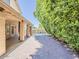 Brick paved backyard featuring lush landscaping, providing a private and inviting space at 13064 N 100Th Pl, Scottsdale, AZ 85260