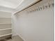 Walk-in closet with shelving and rod for ample storage space at 13064 N 100Th Pl, Scottsdale, AZ 85260