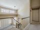 Bright hallway with staircase and large windows, offering natural light at 13064 N 100Th Pl, Scottsdale, AZ 85260