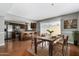 Bright, modern dining room and kitchen area, with plenty of natural light and open space for Gathering meals at 1385 N 44Th St, Phoenix, AZ 85008