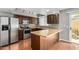 Bright kitchen offers stainless steel appliances and breakfast bar at 1385 N 44Th St, Phoenix, AZ 85008