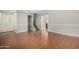 Open living room features hard wood floors, stairs and closet at 1385 N 44Th St, Phoenix, AZ 85008