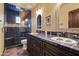 Unique bathroom design featuring dual sinks, custom blue tile, and a glass shower at 13931 E Via Linda --, Scottsdale, AZ 85259