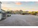 Expansive driveway leads to a beautiful home, surrounded by natural desert landscape and mountain views at 13931 E Via Linda --, Scottsdale, AZ 85259