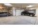 Spacious garage with room for multiple vehicles and a clean, modern aesthetic at 13931 E Via Linda --, Scottsdale, AZ 85259