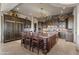 Spacious kitchen featuring a large center island with seating and stainless steel appliances at 13931 E Via Linda --, Scottsdale, AZ 85259