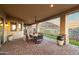Inviting covered patio with outdoor dining, scenic mountain views, and comfortable seating for relaxing and entertaining at 13931 E Via Linda --, Scottsdale, AZ 85259