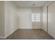 Bedroom with neutral walls, plush carpeting, and a sliding-door closet at 15364 W Acapulco Ln, Surprise, AZ 85379