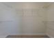 Spacious walk-in closet with multiple wire racks for organized storage at 15364 W Acapulco Ln, Surprise, AZ 85379