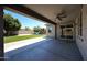 Covered patio providing outdoor living space with view of playground and artificial turf yard at 16475 N 183Rd Dr, Surprise, AZ 85388