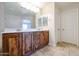 Bathroom with a double vanity, granite countertops, and tile flooring at 16475 N 183Rd Dr, Surprise, AZ 85388