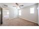 Comfortable bedroom featuring neutral walls, carpeting, and natural light at 16475 N 183Rd Dr, Surprise, AZ 85388