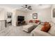 Upstairs loft area with comfortable seating and access to the bedroom at 16565 W Garfield St, Goodyear, AZ 85338