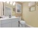 Well-lit bathroom featuring white vanity, tile floors, and neutral wall color at 1723 W Mercury Way, Chandler, AZ 85224