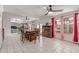 Inviting dining area featuring an open layout to the kitchen, and a ceiling fan at 1723 W Mercury Way, Chandler, AZ 85224