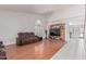 Spacious living room featuring a ceiling fan, and hardwood flooring at 1723 W Mercury Way, Chandler, AZ 85224