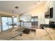 Modern eat-in kitchen with stainless steel appliances and granite countertops at 17371 N 86Th Ave, Peoria, AZ 85382