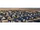 An aerial view showcases houses with well-maintained yards and mature landscaping in this desirable community at 17851 N Mughetto Dr, Maricopa, AZ 85138