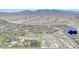 An aerial view of the surrounding neighborhood, highlighting local community features at 18000 W Thistle Landing Dr, Goodyear, AZ 85338