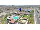 The community pool and recreation center feature lush landscaping and inviting amenities at 18000 W Thistle Landing Dr, Goodyear, AZ 85338
