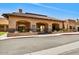 Exterior shot of The Lakes Recreation Center, showcasing the entrance and architectural details at 19025 N 96Th Ave, Peoria, AZ 85382
