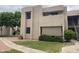 A well maintained exterior of the two-story condo with green lawn at 1920 W Lindner Ave # 222, Mesa, AZ 85202