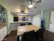 An open kitchen and dining area with stainless steel appliances at 1920 W Lindner Ave # 222, Mesa, AZ 85202