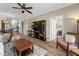 Spacious living room showcasing open layout, adjacent dining, and modern media center at 1941 S Pierpont Dr # 2015, Mesa, AZ 85206