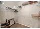 Empty walk in closet with multiple shelves and hanging racks at 1941 S Pierpont Dr # 2015, Mesa, AZ 85206