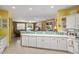 Spacious kitchen with lots of counter space that opens to the living room at 19714 N Concord Dr, Surprise, AZ 85374