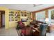 Inviting living room with floor-to-ceiling built-ins and ample natural light at 19714 N Concord Dr, Surprise, AZ 85374