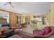 Bright living room with an open floor plan and a seamless flow to the kitchen at 19714 N Concord Dr, Surprise, AZ 85374