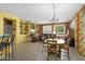 Open floor plan with bar seating and a built-in entertainment center at 19714 N Concord Dr, Surprise, AZ 85374