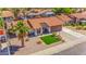 Charming single-Gathering home with a well-manicured front yard and a palm tree at 2009 W Calle Del Norte Dr, Chandler, AZ 85224