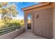 This home has a balcony with a view of trees and the surrounding neighborhood at 22063 N 77Th St, Scottsdale, AZ 85255