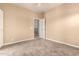This bedroom features neutral tones, and easy access to the other floors of the house at 22063 N 77Th St, Scottsdale, AZ 85255