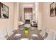 Inviting dining area seamlessly transitions to the living space, perfect for entertaining guests at 22063 N 77Th St, Scottsdale, AZ 85255