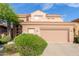 Charming two-story home featuring a tile roof and well-maintained landscaping at 22063 N 77Th St, Scottsdale, AZ 85255