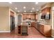 Gourmet kitchen with stainless steel appliances, granite countertops, and custom cabinetry at 22063 N 77Th St, Scottsdale, AZ 85255