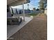 Expansive backyard featuring gravel, artificial turf, lush landscaping, and a charming shed at 2246 E Yale St, Phoenix, AZ 85006