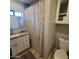 Well-appointed bathroom with granite countertops, updated fixtures, and a clean, modern design at 2246 E Yale St, Phoenix, AZ 85006