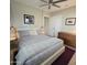 Spacious bedroom with a ceiling fan, pendant lights, and clean, modern decor at 2246 E Yale St, Phoenix, AZ 85006