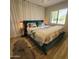 Serene bedroom retreat featuring a plush bed, stylish lighting, and calming decor at 2246 E Yale St, Phoenix, AZ 85006